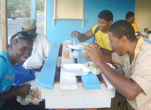 Canouan residents enjoy meals make with lionfish killed in the lionfish tour of the Grenadines last week. (Photo: Mayreau Regatta/Facebook) 