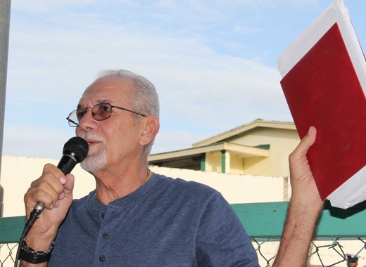 Minister of Transportation Senator Julian Francis holds up decade-old notes of meeting with NOBA and says he is tired of the one and off discussions. (IWN photo)