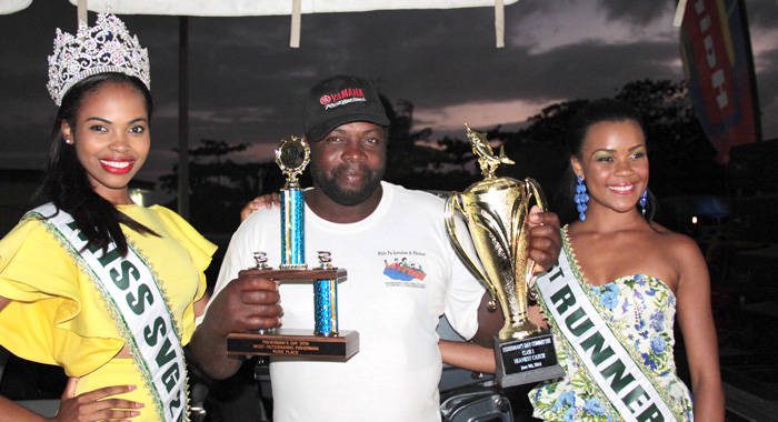 Fisherman of the Year Andrew Gould pose with Miss SVG 2014 Shadeisha George and
First Runner-up Karla Gellizeau. (IWN Photo)