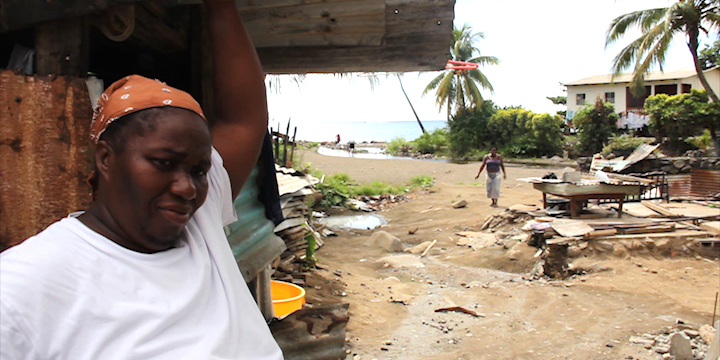 Florestine Spring is seen with what remained of her two-bedroom after the 2013 floods. (IWN file image) 