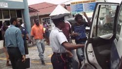 Jamarlo Dunbar (right with Rasta hairstyle) was jailed for wounding while Curtis Joseph (left in orange jersey) was jailed for shoplifting.