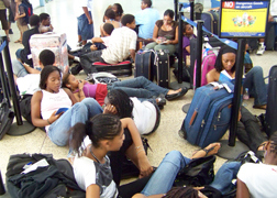 LIAT passengers stranded at E.T. Joshua Airport in June.