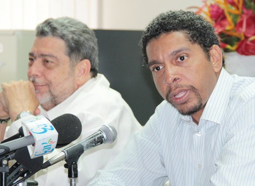 Minister of Telecommunications, Sen. Camillo Gonsalves, foreground, and Prime Minister Ralph Gonsalves are aware of FLOW's customers' complaints. (IWN photo)