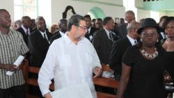 Prime Minister Ralph Gonsalves, centre, and other mourners at the funeral. (IWN photo)