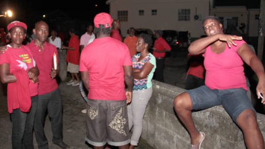 A Grenville Williams supporter expresses dissatisfaction with Jomo Thomas, second left, becoming the candidate. (IWN photo)