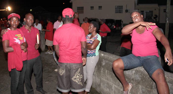 A Grenville Williams supporter expresses dissatisfaction with Jomo Thomas, second left, becoming the candidate. (IWN photo)