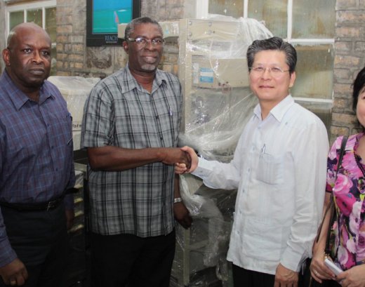 Ambassador Weber Shih handed over the medical equipment and supplies to Minister of Health, Clayton Burgin. (IWN photo) 