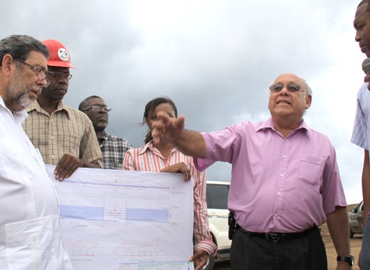 Prime Minister Ralph Gonsalves, left, in August led his Cabinet on a tour of the Argyle Int'l Airport. (IWN photo)