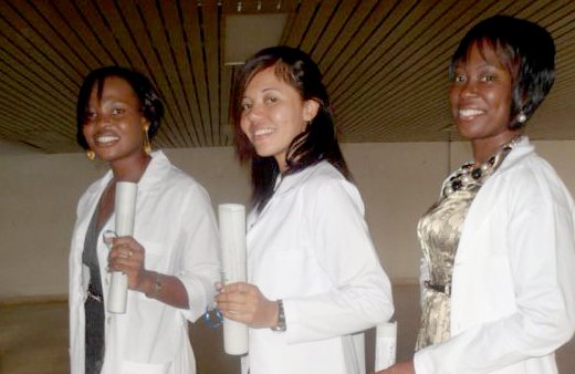 Physicians Arianne Duncan, Joy Walters and Sharmel Frederick proudly pose with their diplomas which qualified them to join the "Army of White Coats".
