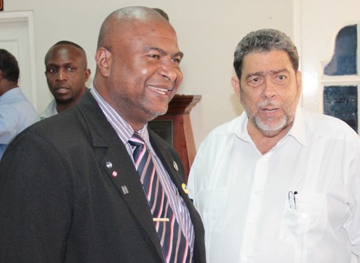Teachers' Union President, Oswald Robinson, left, and Prime Minister Ralph Gonsalves. (IWN file photo)