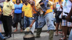 A farmer demonstrates in Kingstown during the NDP's protest march on July 31, 2014 (IWN photo) 