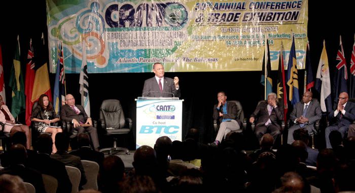 Prime Minister Perry Christie addresses the CANTO conference. (IWN photo)