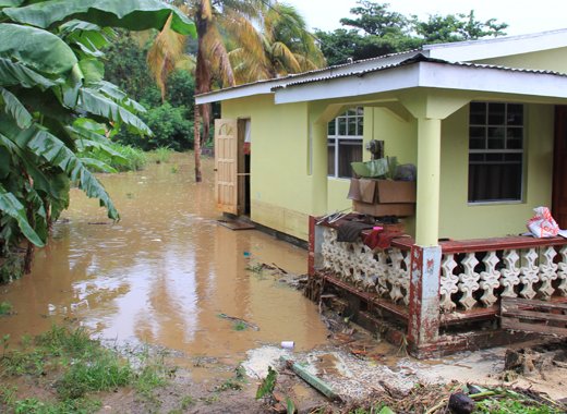 This house in Buccament Bay was flooded out on Saturday. It was also flooded out in the Christmas disaster. (IWN photo) 