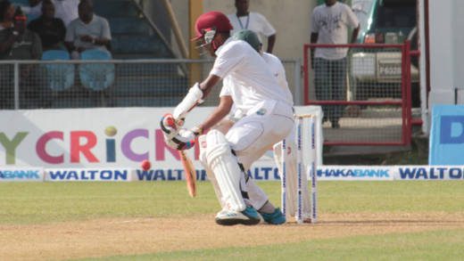 Kraigg Brathwaite drives through the covers to bring his century. (IWN photo)