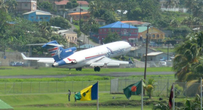In this September 2014 photo, an Amerijet aircraft takes off at E.T. Joshua Airport. (Photo: Colvin Harry/Facebook)