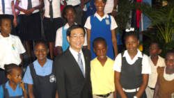 Taiwan Ambassador Baushuan Ger poses with some of the scholarship recipients. 