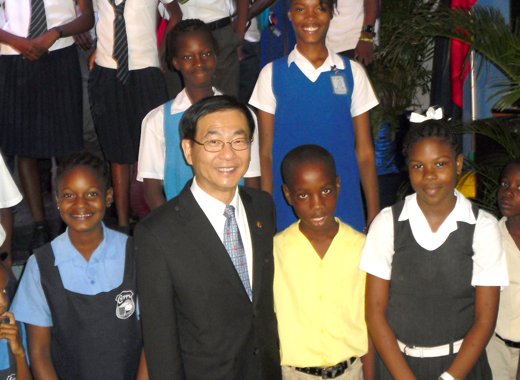 Taiwan Ambassador Baushuan Ger poses with some of the scholarship recipients. 