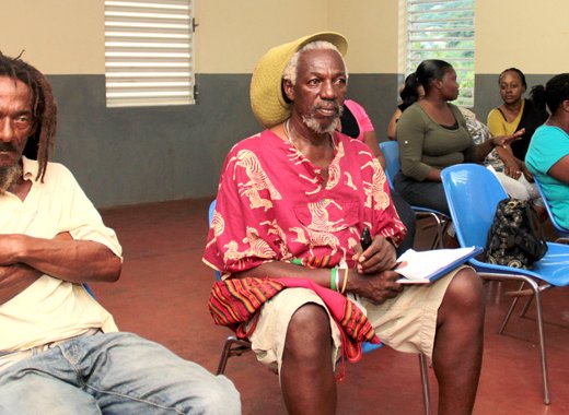 Agrarian Clive "Bish-I" Bishop and other persons at the meeting. (IWN photo)