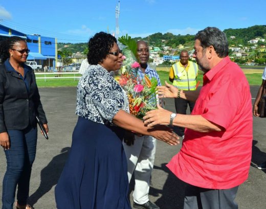 Gonsalves is greeted by Deputy PM, Girlyn Miguel on his return to St. Vincent. (Photo: Lance Neverson/Facebook)