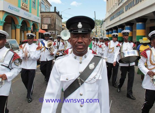 Inspector Bernard Haynes leads the Police Band as they march through Kingstown on Independence Day, Oct. 27. (IWN photo)