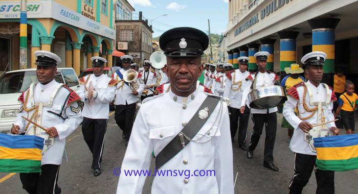 Inspector Bernard Haynes leads the Police Band as they march through Kingstown on Independence Day, Oct. 27. (IWN photo)