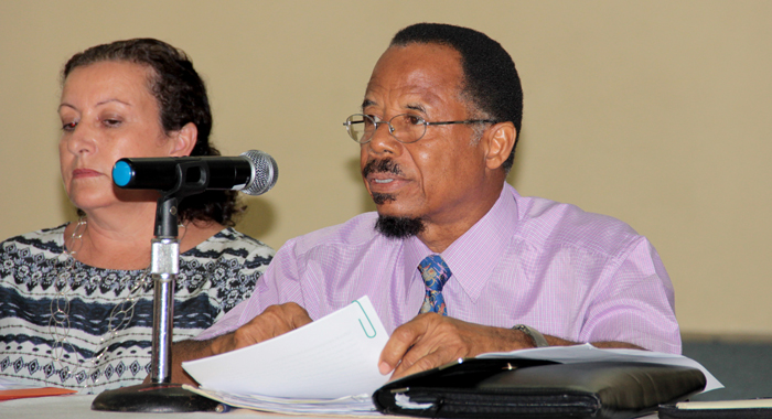 Engineer Glenford Stewart, right, and environmentalist  Marlon Mills at the press conference. (IWN Photo)