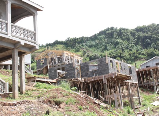 The houses at Green Hill are at various stages of completion, and some of them have not been worked on for weeks. (IWN photo)