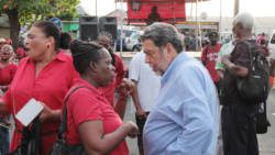 PM Gonsalves chats with teachers in Kingstown after their solidarity march in November. (IWN photo)