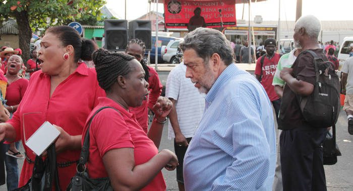 PM Gonsalves chats with teachers in Kingstown after their solidarity march in November. (IWN photo)