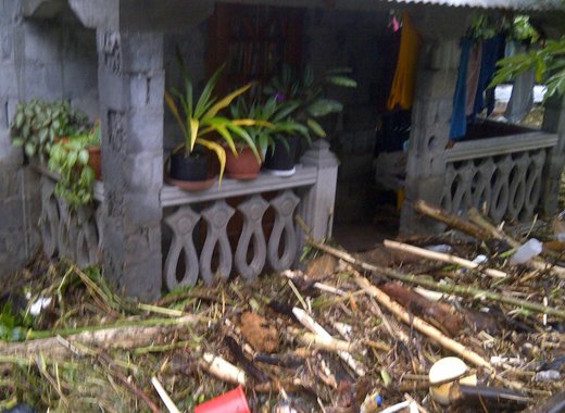The Jefferys' house in Spring Village on Christmas Day 2013, after the floods the previous night.