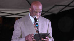 Overseer Nelson Samuel addresses the prayer and peace rally on Sunday. (IWN Photo)