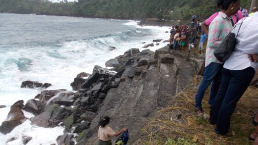 Police say that the large waves, and shoreline caves affected their operations at Rock Gutter. (IWN Photo)