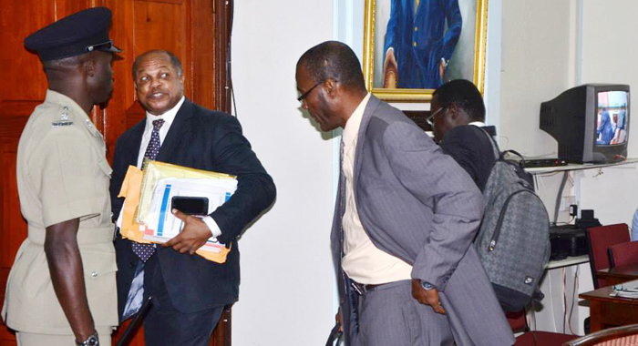 Sen. Linton Lewis, second left, and other opposition lawmakers leave Parliament on Tuesday. (Photo: Lance  Neverson/Facebook)