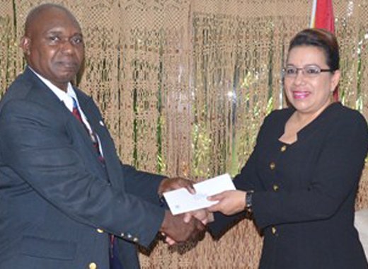 New FAO representative in Guyana, Reuben Robertson presents his credentials to Minister of Foreign Affairs, Carolyn Rodrigues-Birkett. (Photo: GINA)