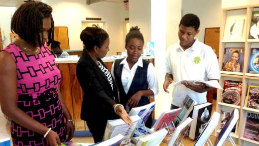 From left: Shana Brewster, Library Assistant, Pearl McMaster-Mason, senior librarian and college students.