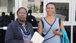 Teacher Jozette Bibby-Bowen, right, and lawyer Nicole Sylvester outside the court on Tuesday. (IWN photo)