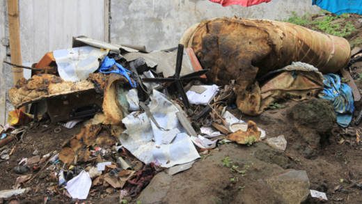 Some of the burnt out content of the house in Layou. (IWN photo)