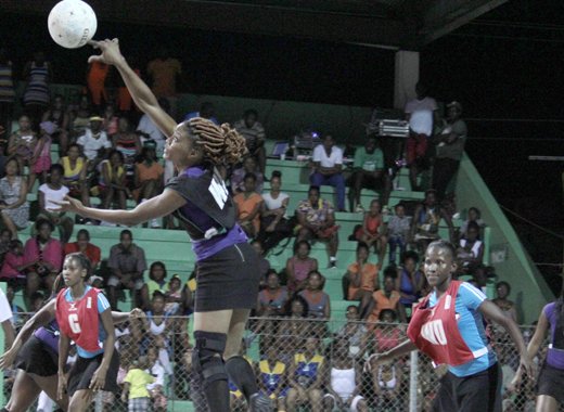 Windward Allstars, in purple, defeated Leeward Stars, 52-51 in the featured match. (IWN photo) 