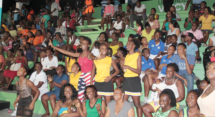 Spectators react to action in the exciting exhibition match. (IWN photo)