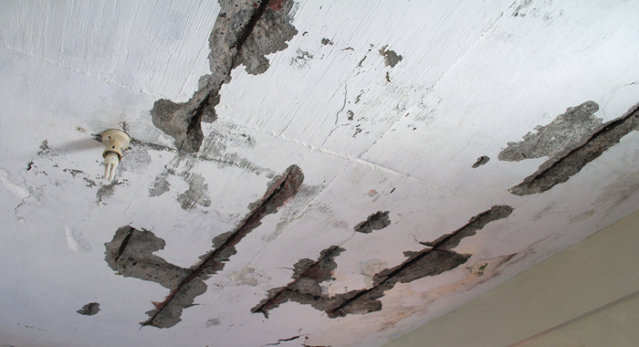 Parts of the concrete roof of the house have been cracking off. (IWN photo)