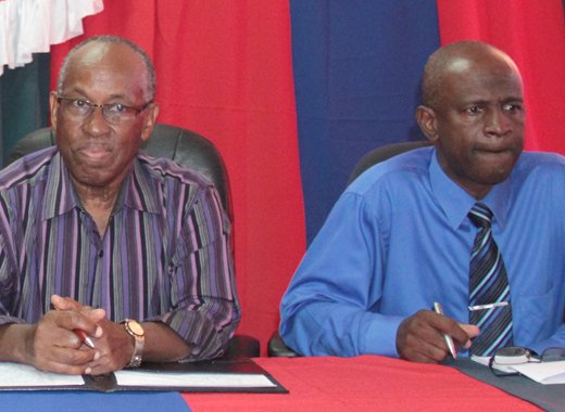 Sir Louis Straker, left, and Maxwell Charles at the press conference on Monday. (IWN photo)