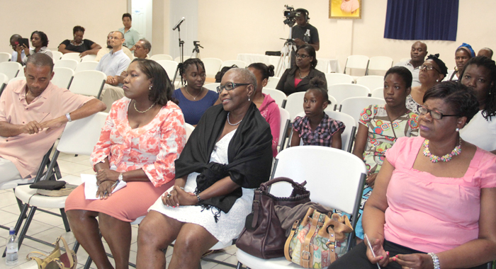 SVG Human Rights Association President Nicole Sylvester,  third left, and other members of the audience at Saturday's event. (IWN photo)