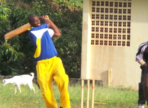 Clinchers batsman Carlon John pulls during his 34.