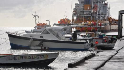 Grenadian fishermen prepare to head out to sea. They say they have been catching less fish and their livelihoods are threatened by climate change. (Photo: Desmond Brown/IPS)