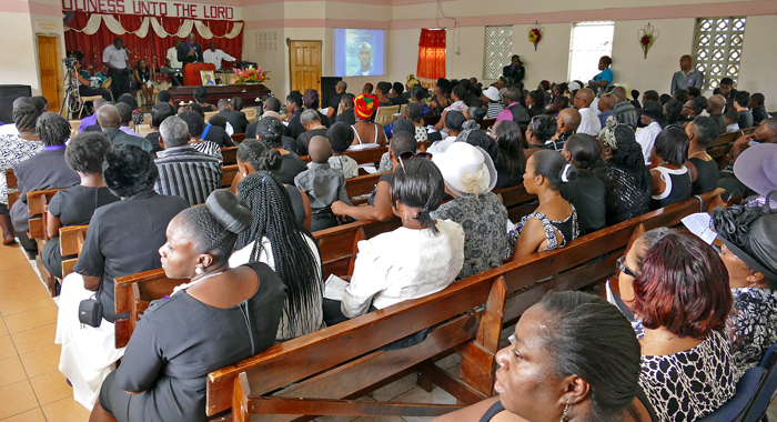 Mourners at the funeral on Sunday. (Photo: Jamali Jack)