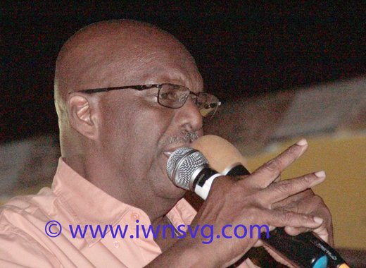 NDP president and Leader of the Opposition Arnhim Eustace speaking in Sandy Bay Friday night. (IWN photo)