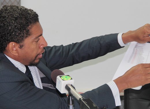 Minister of Technology Sen. Camillo Gonsalves holds a list of several websites hacked by "Moroccan Wolf", including gov.vc. (IWN Photo)