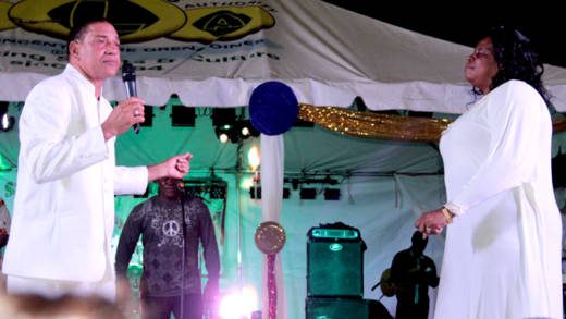 Felix "Dalpin" Findlay and his wife, Monica, formerly calypsonian Valley Dove, perform during Gospel Fest 2015.  (IWN photo)