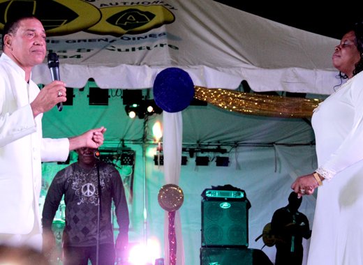 Felix "Dalpin" Findlay and his wife, Monica, formerly calypsonian Valley Dove, perform during Gospel Fest 2015.  (IWN photo)