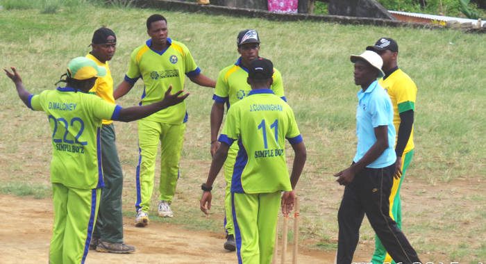 Players of Simple Boyz in heated argument with umpire during Sunday's final. (Photo: E. Glenford Prescott) 